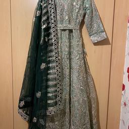 Dress
Large/size 14
Green with silver/gold embroidery
Dress, scarf, trousers and matching bag

Length 57inch
Chest underarm to underarm flat 20inch
Sleeve length 20inch
Netting underneath to give the dress some lift

Worn once for a mehndi. Excellent condition.
Original price £110
Selling for £50ono

Collection only from OL41RF