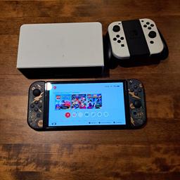 Nintendo switch oled comes with everything you see Original joy cons plus pikachu joy cons and 2 games Mario kart deluxe 8 and Friday the 13th will be reset before sale