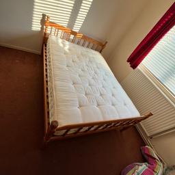 Solid pine double bed with or without mattress 
Used but comfortable mattress 
Used mattress has some stains comes free with bed 
Heavy and sturdy bed frame 
Dismantle ready to go 
Can deliver for extra charge