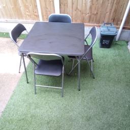 black table and 4 folding chairs good condition