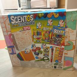 #Scentos Scented Mega Activity Set

Includes:
• Colour in carry case (box is damaged and coloured in on one side)
• 10 sheets of paper
• 10 scented fine line Markers
• 10 scented fibre tip pens
• 12 scented coloured pencils
• 20 scented crayons
• 4 scented dough tubs
• 1 rainbow pen
• 1 pair of scissors
• 1 sticker sheet

Age: 4+
Condition: #newwithouttags all contents are new. Felt pens used once to colour in the box.