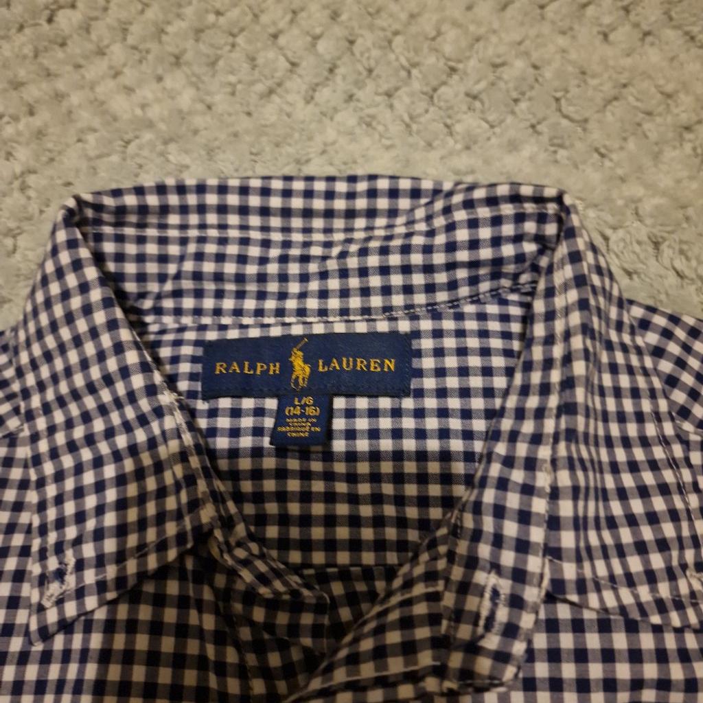 Hi

Selling this fab and very trendy Boys Ralph Lauren Blue Check Shirt with classic small pony logo to the chest. Size Large (14-16 years). Originally cost £75 from House of Fraser.

Only worn Once so its like new in excellent condition with plenty of wear left in it still.

Very smart to wear to parties or any other event.

Grab a fantastic bargain now

Comes from non smoking and pet free household

Please see my other items aswell.

Thanks