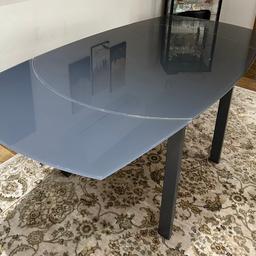 The table is now on sale for £600 (the last 2 pictures is the price and layout of the table in the shop), but I will sell it for £200. It is an extendable table: 90cm in width, 120cm in length when not extended and 180cm when extended. It is in good condition.