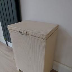 Original 1930s Vintage Lloyd Loom Laundry Basket.
This item has obviously been used but it is in excellent condition with all original handles, hinges, and lid chain to add to it's vintage appeal.
Carefully restored with a furniture coat of old Hessian.
The lining has been replaced with a 100% Cotton insert with press studs for easy removal and cleaning.
SIZE 35cm wide x 26cm deep x 55cm high.
This is a beautiful piece for the bedroom, bathroom, or landing.
All clean ready to use.
Regards