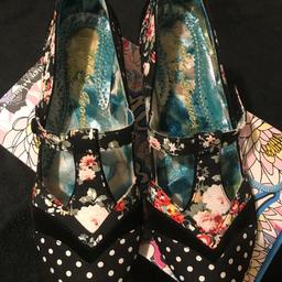 A beautiful pair of irregular choice kitten heel shoes ,size 7,spare heel tips included.