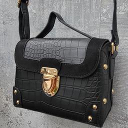 Aldo Womens Small Black Bag With Gold details!
Brand New !