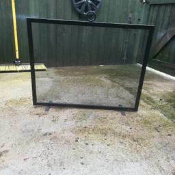 As seen in the picture heavy black metal free standing fire guard approx 30 inches wide x twenty four inches high good condition.