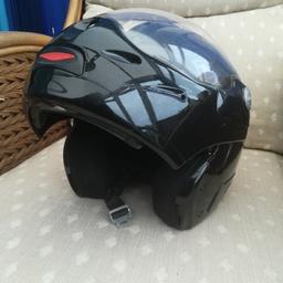 As seen in the pictures in good condition black medium sized flip front helmet.