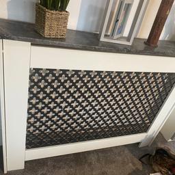 Hi I’m moving out and I up-cycled  this radiator cover. Have disassembled it now, but it can be put together again with some wood glue or nails   Please check measurements carefully. 116cm width x 90 cm height. The shelf/cover on top is a bit wider at 120cmx 90 cm. Depth18 cm or 20 cm with top shelf/cover