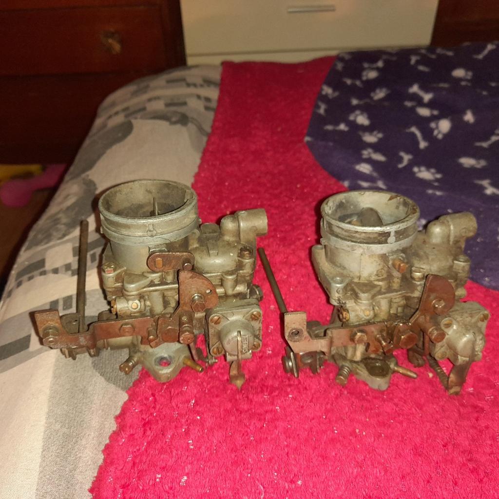 here are two triumph herald solex 1200 carburettors one is complete and the other is for spares