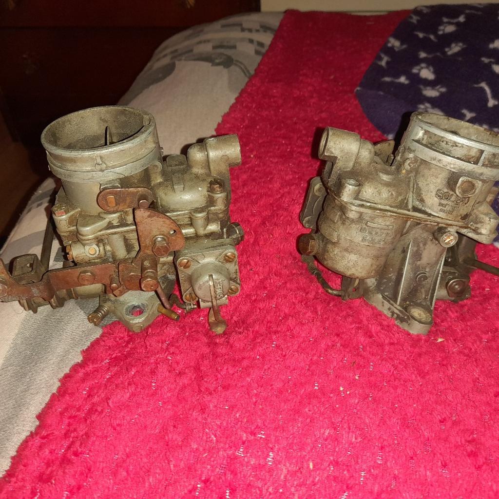 here are two triumph herald solex 1200 carburettors one is complete and the other is for spares