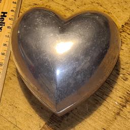 Aluminium heart shaped case for storing sweets, jewellery or other trinkets.

Can also be used to prank someone who has a cold heart ❤️ as long as they have a sense of humour!

Either way, this won't need a vase, water or have any petals falling off.  Forever heart.

Dimensions approx L10W10D8cm.

This can be polished up to a mirrored shine, or enhanced with some craft work.

Listed on other selling platforms too so grab yourself a bargain before someone else beats you to it.