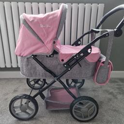 Like New - SilverCross Toy Ranger Pram and shoulder bag

Handle adjusts from 45 - 72.5cm
Easy to fold and store
Large mesh storage basket, foldable hood and removable apron
Dimensions: 63.5L x 42W x 70H cm

Still sold in Smyths

From a smoke & pet free home.