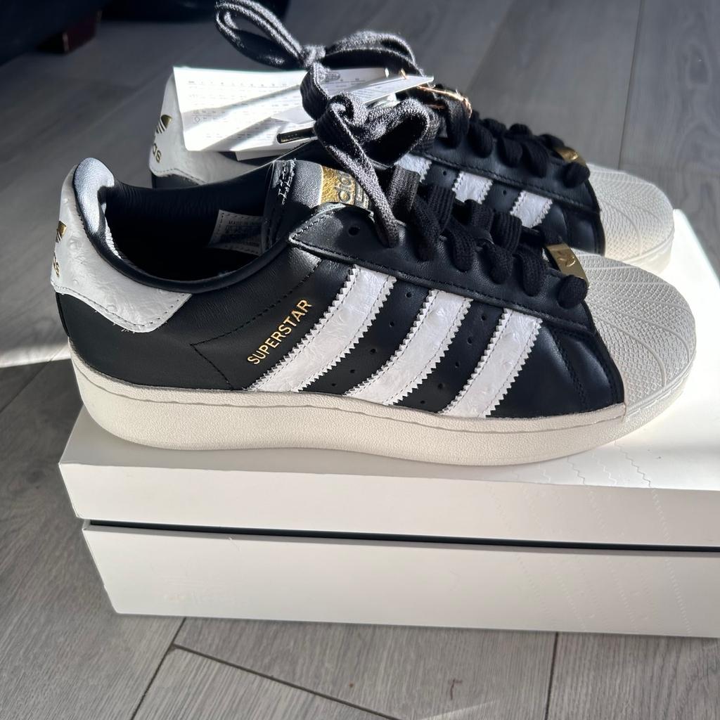 Women's Black & White Adidas Platform Superstar Limited Edition gold badge size 7.5 brand new in the original box with the Tags on. A gift that was way too big for me. I'm only a 6. So gutted they don't fit me. They are limited edition & very hard to come back out of stock everywhere online included cost £160 selling for £50 grab a bargain.