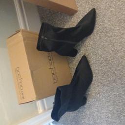 brand new heeled black boots. never worn. sz 7. collection wn3