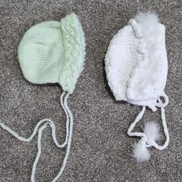 beautiful hand-made baby newborn bonnets, they were only worn a few times. Purchased from a buitiqe lovely pair can be used for a boy or girl.