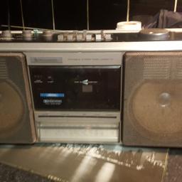 retro stereo tape player,  tape recorder and  radio in working order..