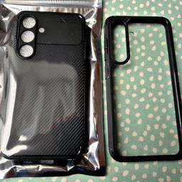Samsung s24 2 x Hüllen Schwarz NEU.
Eine Komplet Schwarz ,die andere Schwarze Umrandung und innen Transparent.
Hab es zusammen mit Handy gekauft .hab mich aber für Handy Cover entschieden. Beiden Sind Neu noch nicht gebraucht.