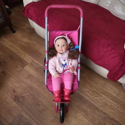 Molly doll (Chad Valley) with 3-wheeled pushchair made for her. Also comes with clothing, socks, shoes some hair accessories. All in excellent condition. 

Collection from Worcester Park only