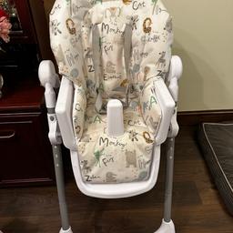 Like new baby high chair 
With small basket underneath 
Detachable table