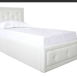 Brand new still in box 
GFW Hollywood crystal gas lift Ottoman Bed 
• White faux leather 3ft (90cm) single
• Diamante crystal embellishments
• Attractive cross stitch detailing
 •Modern and low priced
 •Sprung slatted base
•Width: 105 cm × Length: 206,5 cm × Headboard Height: 109 cm × Footboard Height: 36 cm