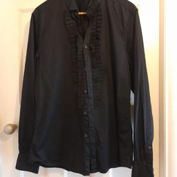 As new black shirt with ruffle down front.
Ex. cond. 
fy3 layton or can post extra