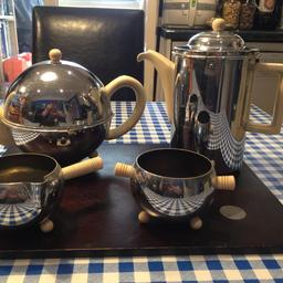 Beautiful Art Deco tea/coffee /milk/sugar bowl
Steel and pottery 
Great condition, pottery inside
Pick up only