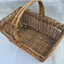 Vintage Fruit Basket Wicker Basket with split designed handle from France.

A display basket which would be a great decorative touch to your country farmhouse home!

There is slight damage to the side where one strand came off.  Can be restored, but adds a little scar that it's lived am active life.

(L x W x H) 35 x 30 x 15cm
(30cm with handle)- measure layer.

Listed on other selling platforms too so grab yourself a bargain before someone else beats you to it.
