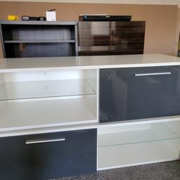 2 x unit with glass shelf and grey door which flips down, size is 1200 w x 350 H x 450 D each