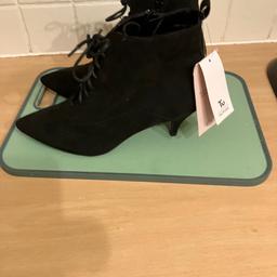 Ladies boots brand new still with labels on.