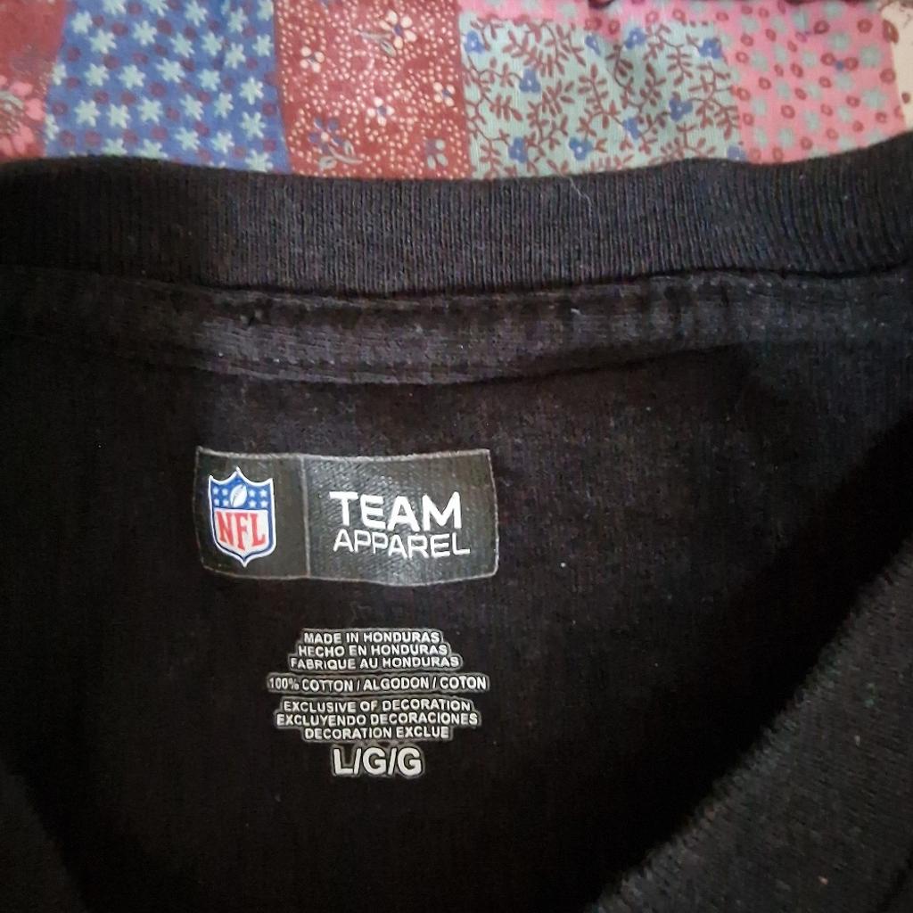 NFL Team Apparel Size L
100% Cotton
Length 28"
Pit to Pit 20"
Sleeve 23"