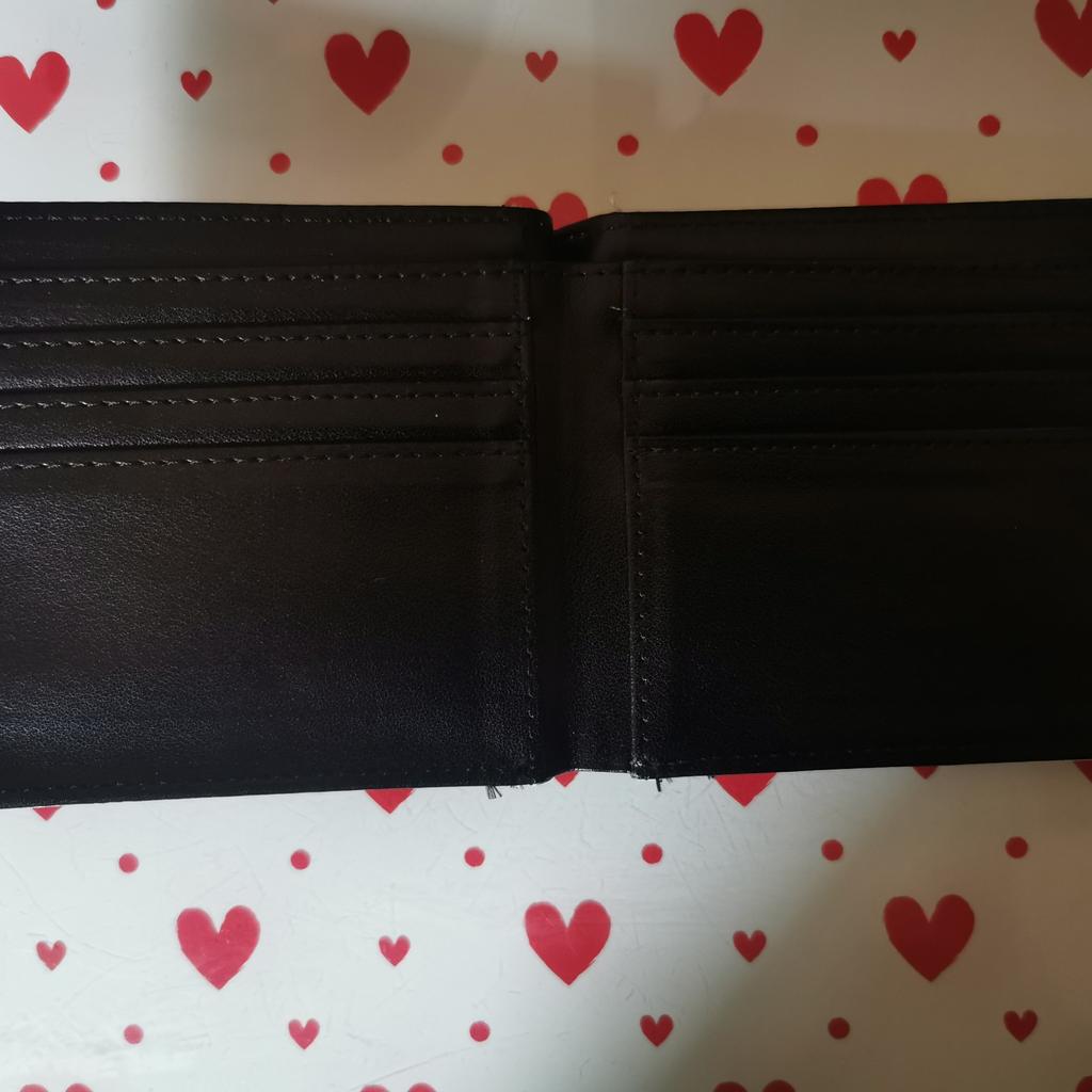 JOHN LENNON WALLET IN UNUSED CONDITION(SEE PICS FOR FULL DETAILS)