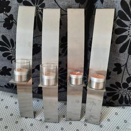 4 Stück wandhalter mit Teelicht in silber
2 Stück mit Glas und 2 ohne ...38cm