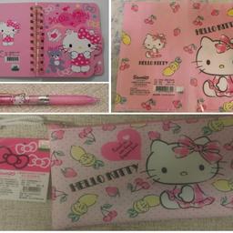 #valentine is in the air

Hello Kitty Pink bundle formed of
- Spiral Notebook
- Mechanical Pencil
- Document Holder
- Pen Pencil Holder Case with zip

This bundle is for a total of 4 Hello Kitty Sanrio items.

Treat yourself or a loved one to this adorable Hello Kitty stationery set.

It includes a pink spiral notebook with 60 lined pages and 15 Hello Kitty shaped pages (see picture) for your notes, doodles, and sketches. The notebook measures about 14 x 10.5 cm (paper size, not including the spiral).
A matching pink mechanical pencil that is easy to use and refill.
A hard plastic document holder which can be used to hold several document types or boarding passes (it is double sized and it is foldable in two - item code 01) - Size folded: approx 21 x 12 cm - Size opened: approx 24 x 20.50 cm
A Pen Pencil Holder Case with zip with tags (measure approx 16 x 10 cm)
Paypal payment and shipping to registered address only for buyer and seller guarantee.
Free Tracked 48 to mainland UK