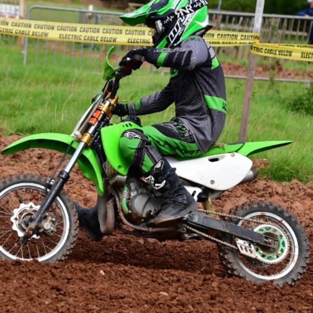 Here is my sons kx65 just had new chain an sprockets new seat cover new plastics unbreakable rfx anodised levers new grips recently had engine rebuild 2 hours ago have receipt to proove he needs an 85 so open to swaps
