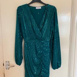 It’s a very beautiful dress with the shiny secrets of work on it from quiz size 10 and it’s brand new not being worn at all.