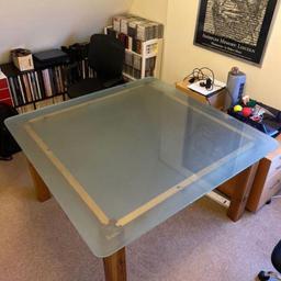 Custom made to order, large glass table.
140cm x 150cm
Very heavy (about 50 kilos)
Thick glass and beautiful wood base.
The entire unit is dismountable for safe transport.


Needs atleast 2 people to move it.