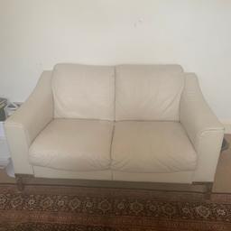Real cream leather 2 seater sofa. In good condition with Crome legs. Pictures of flaws also taken. Size is height approximately 68cm, width approximately 143cm and depth is 55cm. Collection only from London NW2 7RU