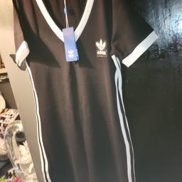 brand new ladies adidas dress black and white colour medium size but comes up quiet big stretchy so would fit form 8 to 12 maybe even a 14 size collection se28 or can post