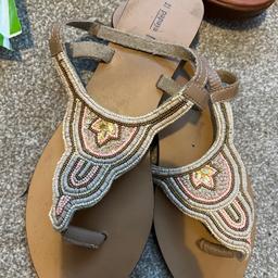 Flat sandals. Minimal signs of wear only worn a couple of times. Size 8.