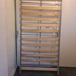 single bed frame
metal bed frame with wooden slats
All good and great condition. 
Been in storage and not used . Only twice