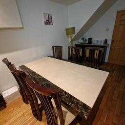 REDUCED FOR QUICK SALE.

Real marble dining table with matching 6 chairs

Marble table has chips at the corners but the set is otherwise in good condition with general wear and tear. Selling due to moving house and size being too big.

Table size: L180cm x W100cm x H76cm

Collection only. Will need 3-4 strong people to collect due to its weight as it is real marble and will need a large vehicle or van (see above sizes).

£380 is for the dinning table and chairs. The price already takes into account the cost for collecting and the damage.

There is a matching sideboard also available for an additional £300.

REDUCED FOR QUICK SALE.
