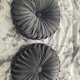 Two stylish dark grey round pintuck cushions 
Perfect to compliment bedding or the sofa
Like new as only a few months old
Selling from a pet and smoke free home 
Can deliver if very local to WA11