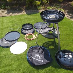 cadac which has only been used a handful.of time come with cover and extras

roast pan
chef pan
bbq grill
pizza stone plate