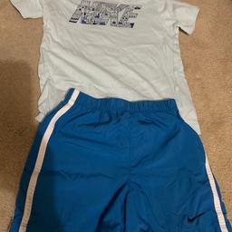 Nike t shirt and shorts set. Pale blue t shirt/darker blue shorts. Good condition. Great for the summer! Age 24-36months