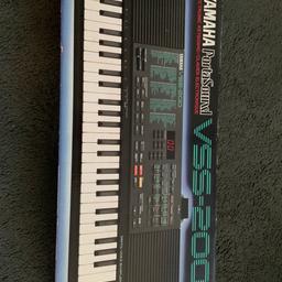 The Yamaha VSS-200 is a portable musical keyboard released in 1988. It uses FM Synthesis to generate sounds and contained 100 presets. It can also record short samples using the built-in microphone. It is also possible to sample the internal sounds in order to process them with the DSP effects. Samples can be assigned to the melody (default setting), bass, and chord sections, allowing them to be used as part of the auto accompaniment modes. This electronic keyboard is a vintage masterpiece that will elevate your musical experience to another level. It bears the renowned Yamaha brand and is suitable for keyboard enthusiasts who appreciate quality sound. The instrument is perfect for creating magical melodies and exploring new soundscapes. This keyboard has barely been used is still in excellent working condition due to safe storage. It is a rare find, especially for vintage enthusiasts. The Yamaha VSS-200 keyboard is perfect for both beginners and professionals.
Comes with a stand.