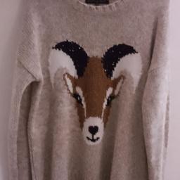 Designer Animal jumper - size 14/42. Label is Heart & Soul.
99% acrylic, 1% polyester and colour is a brown marl and animal face with sequin detail.
It is in good condition and please see also the photographs which form part of the description.
Collection from Harlington near Heathrow and Hayes (Elizabeth Line) with cash on collection please.