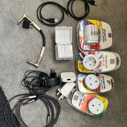 World wide travel adapters and cables; some new some used.