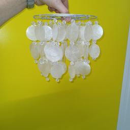 Lightshade with dangling opalescent  round discs and bead detailing, 60 watt max,