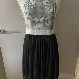 Size 14 
Lion Dress Stunning on 
Excellent Condition